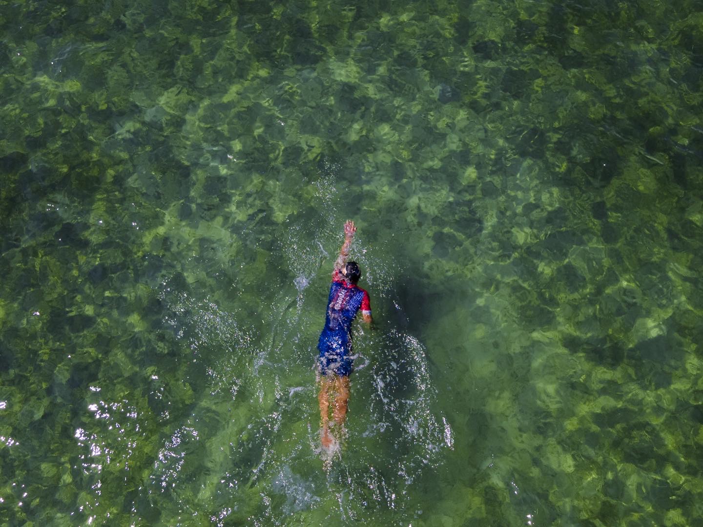 Triathlete competing